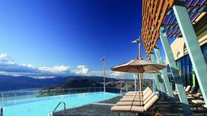 Indoor pool, outdoor pool, open 7 AM to 10 PM, pool loungers