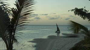 Private beach, white sand, beach towels, snorkeling