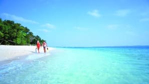 Private beach, white sand, sun-loungers, beach umbrellas