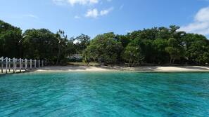Private beach, white sand, sun-loungers, beach umbrellas