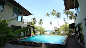 Outdoor pool, pool umbrellas, sun loungers