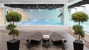 2 indoor pools, open 6 AM to 10 PM, pool loungers