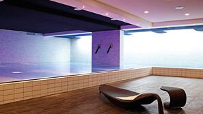 2 indoor pools, open 6 AM to 10 PM, pool loungers