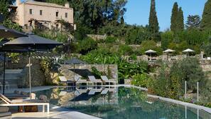 2 outdoor pools, pool umbrellas, sun loungers