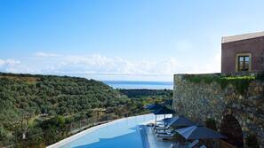 2 outdoor pools, pool umbrellas, sun loungers