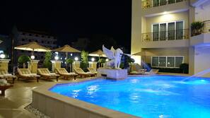 Outdoor pool, pool umbrellas, pool loungers