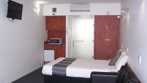 Desk, blackout curtains, iron/ironing board, cots/infant beds