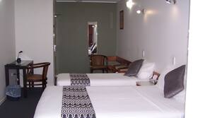 Desk, blackout curtains, iron/ironing board, cots/infant beds