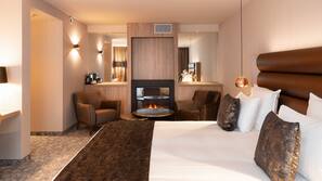 Een minibar, een kluis op de kamer, een bureau, gratis wifi