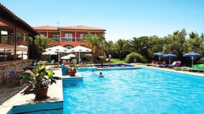 2 outdoor pools, pool umbrellas, pool loungers