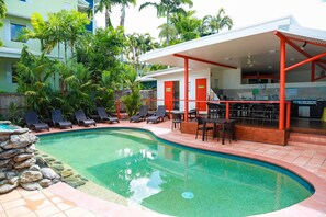 Outdoor pool, pool umbrellas, sun loungers