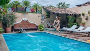 Outdoor pool, open 8 AM to 10:30 PM, sun loungers