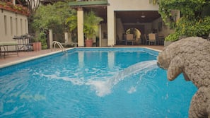 Outdoor pool, open 8 AM to 10:30 PM, sun loungers