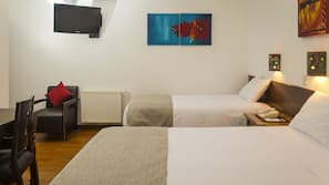 Premium bedding, pillow top beds, minibar, in-room safe