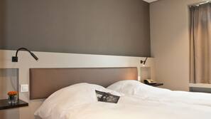 Luxe beddengoed, een kluis op de kamer, individueel gedecoreerd