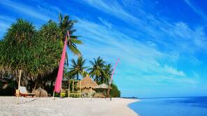 Private beach, white sand, sun loungers, beach umbrellas