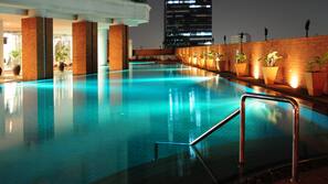 Outdoor pool, pool umbrellas, sun loungers