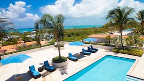 2 outdoor pools, pool umbrellas, pool loungers