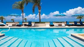 2 outdoor pools, pool umbrellas, pool loungers