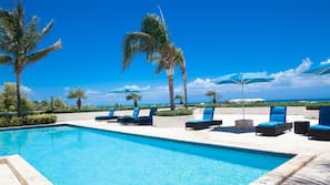 2 outdoor pools, pool umbrellas, pool loungers