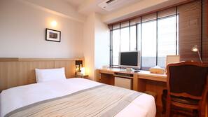 Premium bedding, down comforters, in-room safe, desk