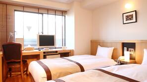 Premium bedding, down comforters, in-room safe, desk