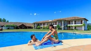 Outdoor pool, pool umbrellas, pool loungers