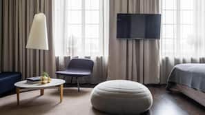 Luxe beddengoed, een minibar, een kluis op de kamer, een bureau