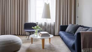 Luxe beddengoed, een minibar, een kluis op de kamer, een bureau