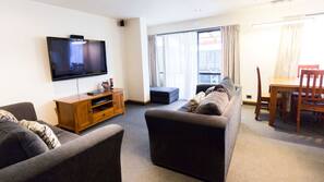 Flat-screen TV, pay-per-view films