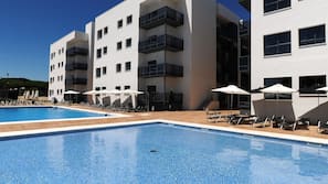 2 outdoor pools, pool umbrellas, pool loungers