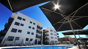 2 outdoor pools, pool umbrellas, pool loungers