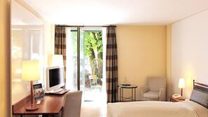 Luxe beddengoed, traagschuim, een kluis op de kamer, een bureau