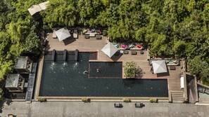 Seasonal outdoor pool, free pool cabanas, pool umbrellas