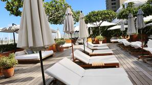 2 outdoor pools, pool umbrellas, pool loungers