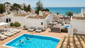 2 outdoor pools, pool umbrellas, pool loungers