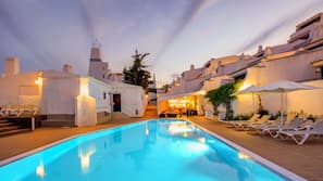 2 outdoor pools, pool umbrellas, pool loungers
