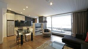 Flat-screen TV, DVD player, iPod docking station