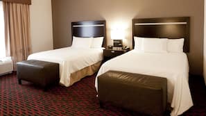 Hypo-allergenic bedding, pillowtop beds, in-room safe, desk