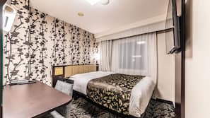 Premium bedding, down comforters, in-room safe, desk