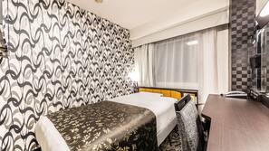 Premium bedding, down comforters, in-room safe, desk