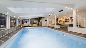 Indoor pool, seasonal outdoor pool, pool umbrellas, sun loungers