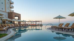 7 outdoor pools, open 9 AM to 9 PM, cabanas (surcharge), pool umbrellas
