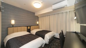 Blackout curtains, iron/ironing board, free WiFi, linens