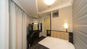 Blackout curtains, iron/ironing board, free WiFi, linens