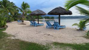 On the beach, kayaking