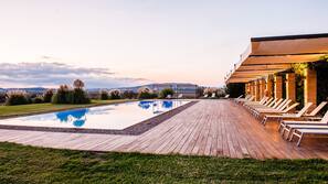 Outdoor pool, open 8:00 AM to 8:00 PM, pool umbrellas, pool loungers