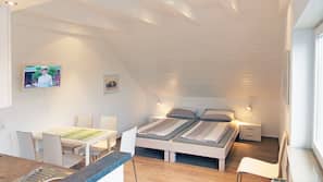 Couette en duvet d'oie, minibar, coffre-forts dans les chambres
