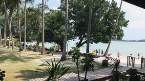 On the beach, sun-loungers, beach umbrellas, beach towels