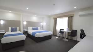 Hypo-allergenic bedding, down duvet, pillow top beds, minibar